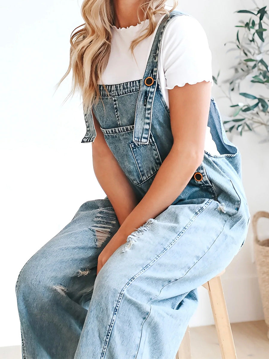 Women's Loose Fit Distressed Denim Overalls in Medium Blue color.