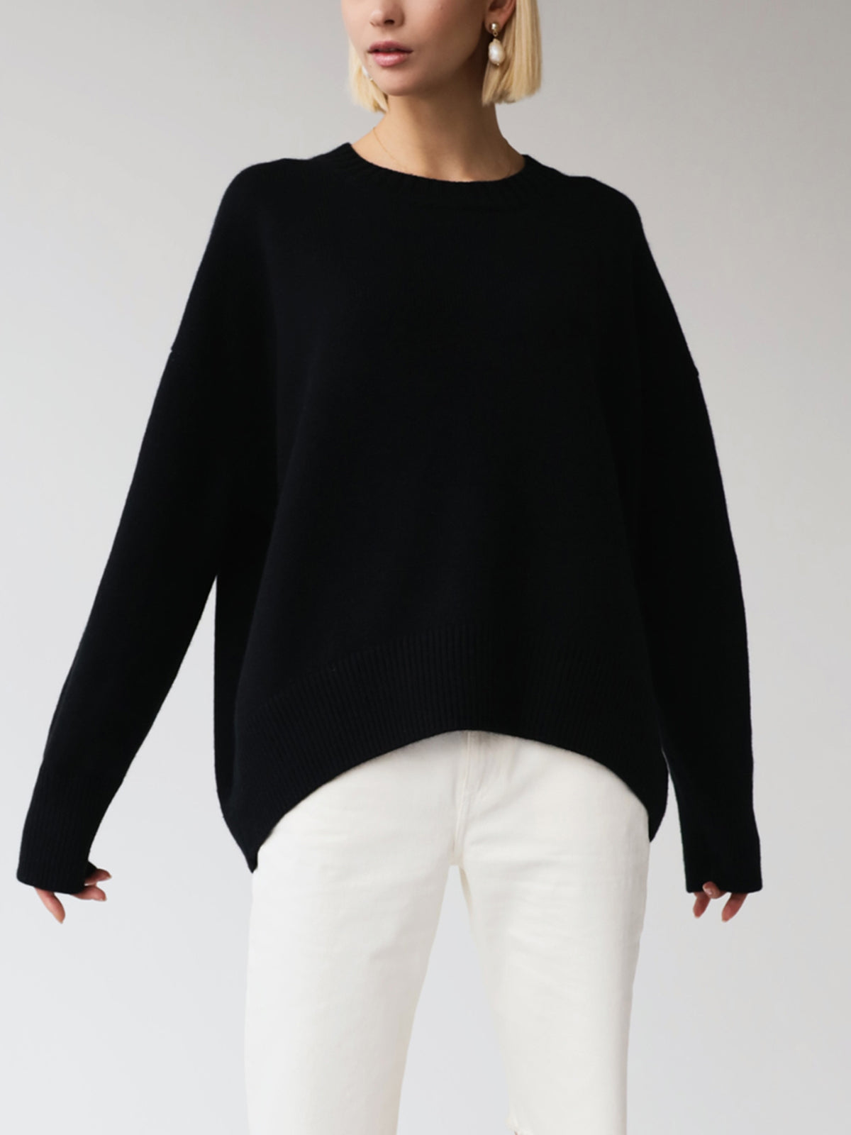 Women's Oversized Crewneck Knit Sweater, side view.
