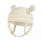White baby helmet with bear ears on a beige background, labeled 'Rice (waffle)'.
