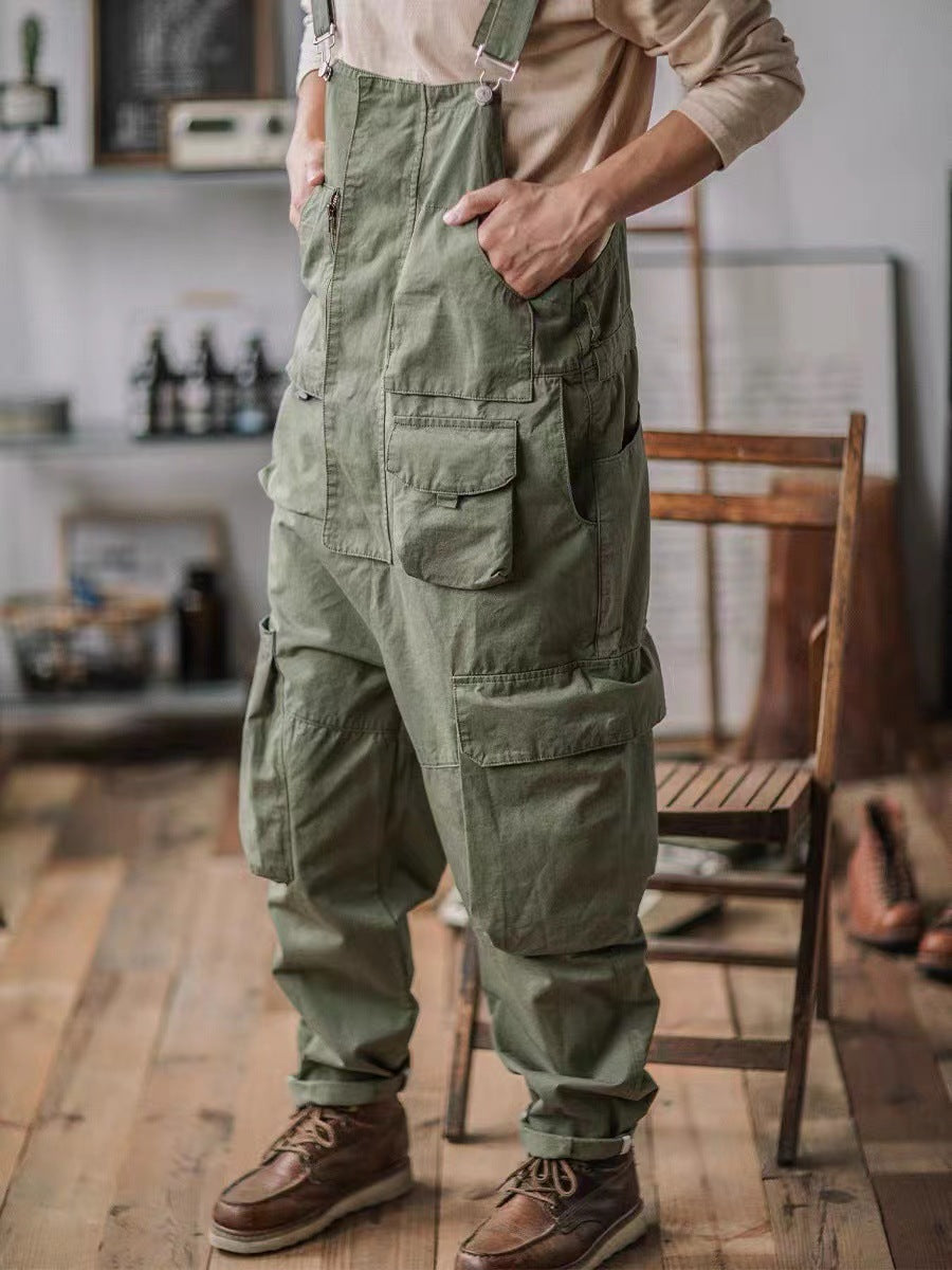 Men’s Slouchy Artisan Overalls in Black color, featuring weathered nickel hardware.