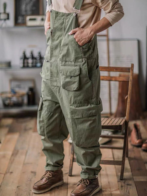 Men’s Slouchy Artisan Overalls in Black color, featuring weathered nickel hardware.