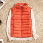 Aura | Women’s Ultralight Down Vest – Architectural Feather-Light Layering & Refined Thermal Grace orange