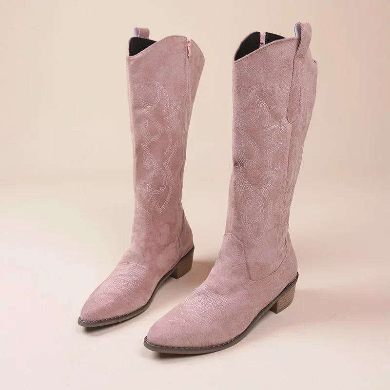 Women's knee-high cowboy boots with stylish embroidery design.