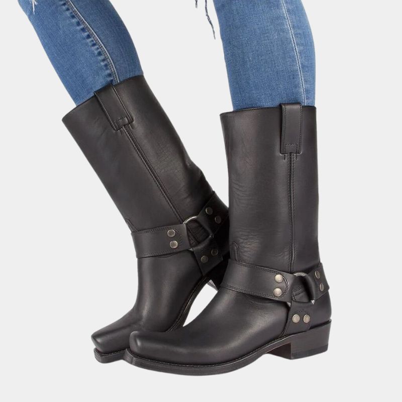 Women's slip-on winter boots with buckles in black.