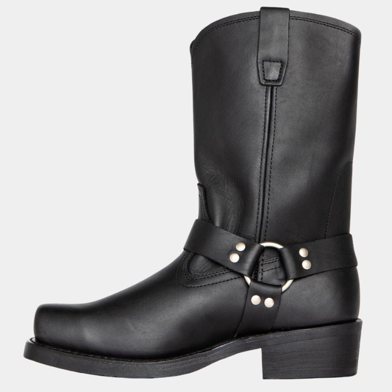 Women's slip-on winter boots with buckles, side view.